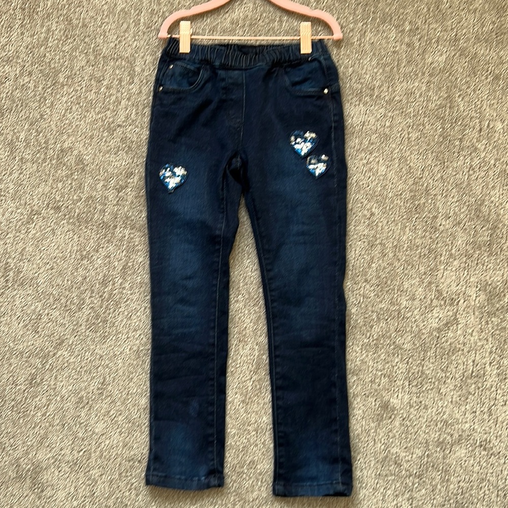 Ido jeans girls size 7 with sequin hearts in front and back.